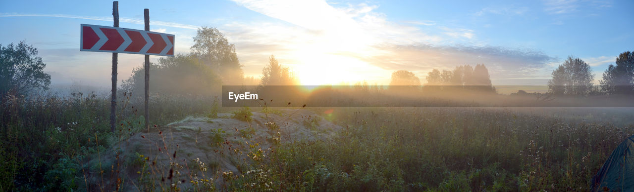 Scenic view of landscape against sky during sunset