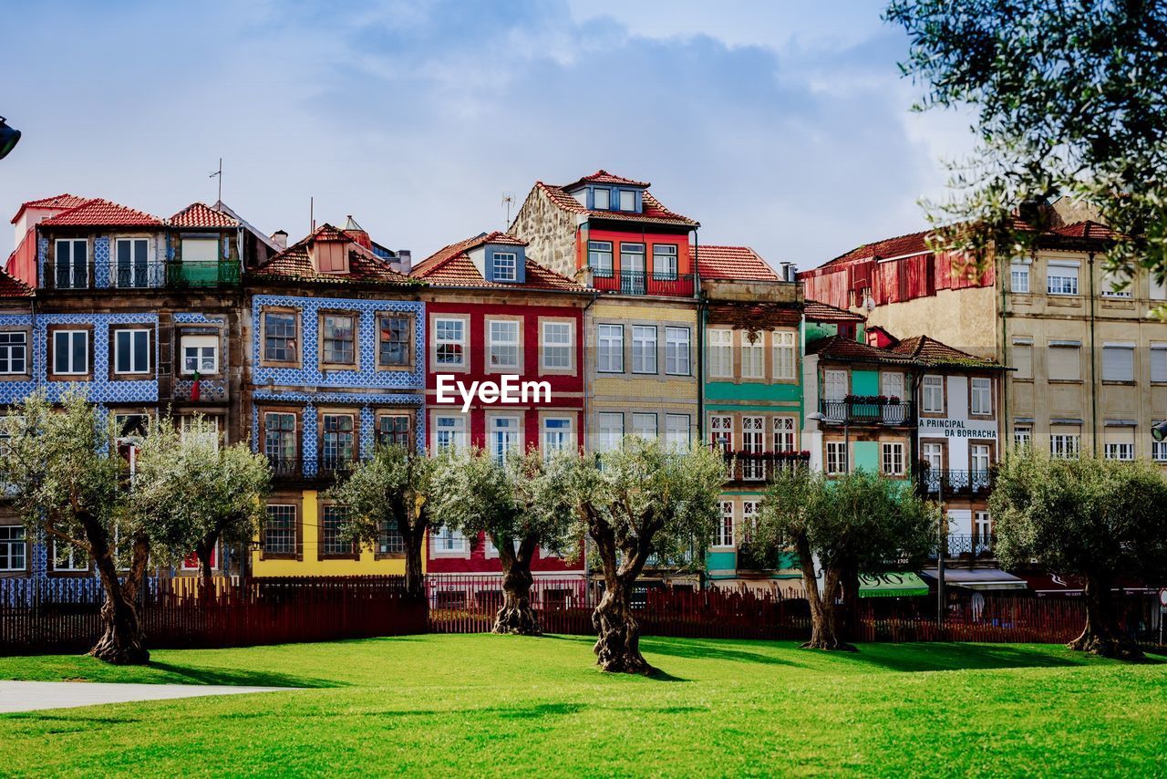 View of residential buildings against sky