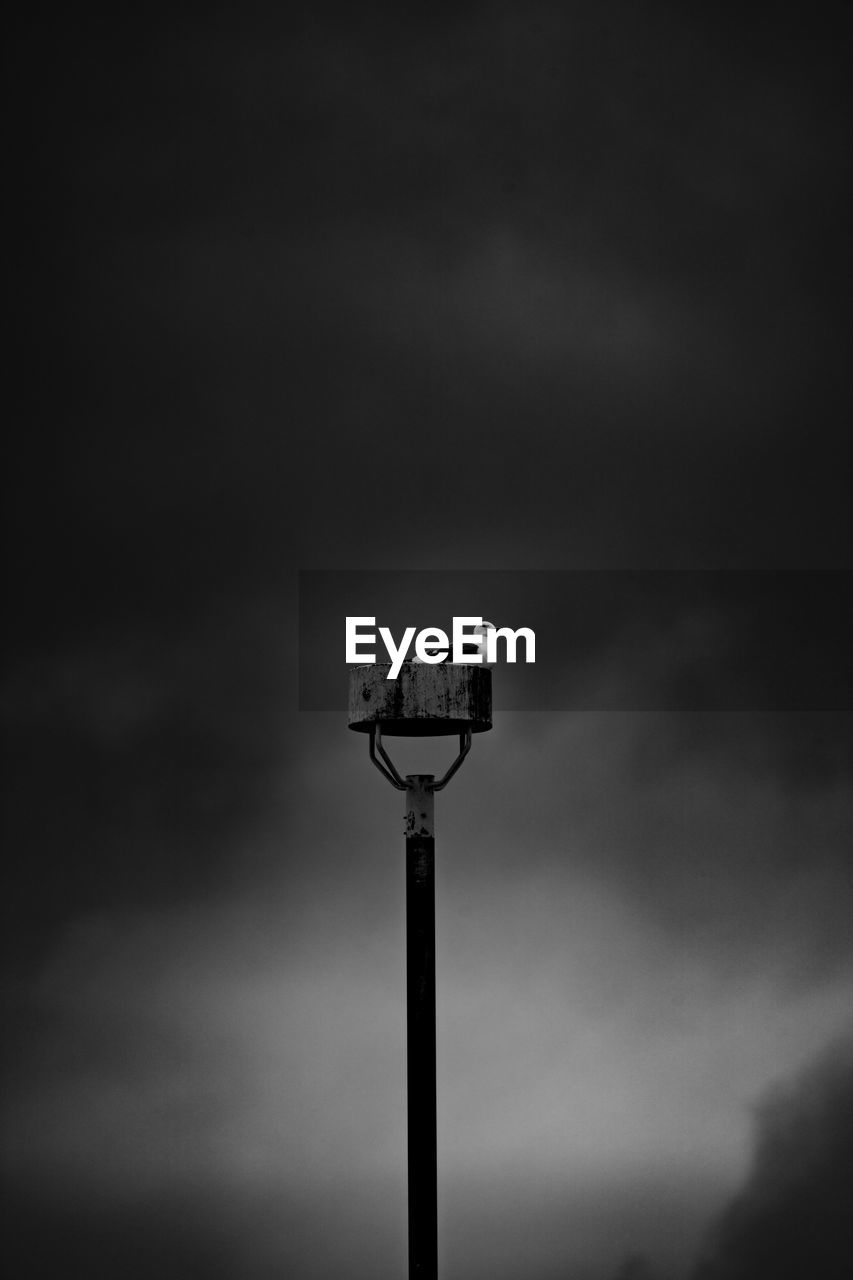 darkness, light, sky, street light, cloud, black and white, black, monochrome, lighting, lighting equipment, monochrome photography, floodlight, no people, low angle view, white, technology, night, light fixture, street, nature, copy space, outdoors