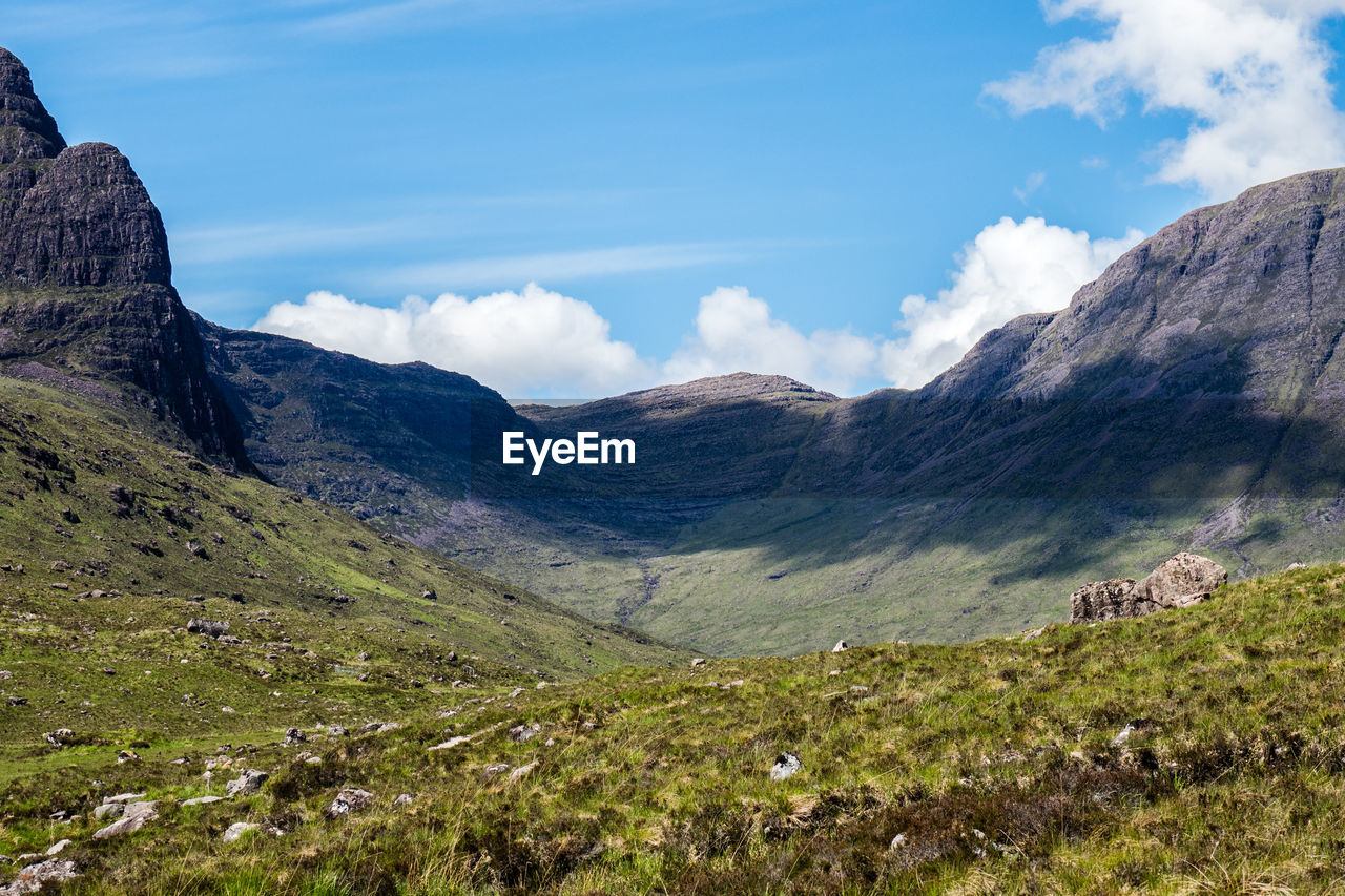 View from a valley to a mountain pass in the scottish highlands