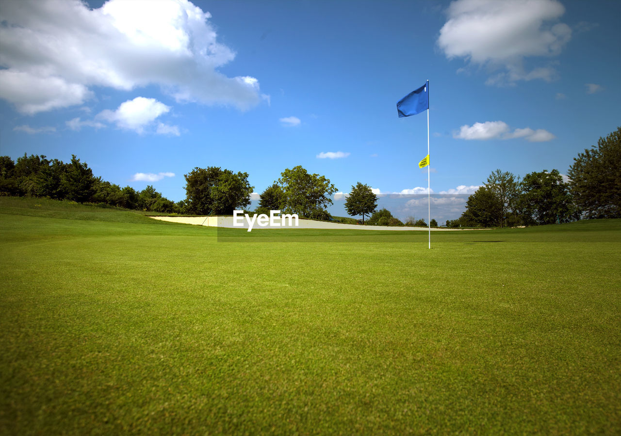 VIEW OF GOLF COURSE AGAINST SKY