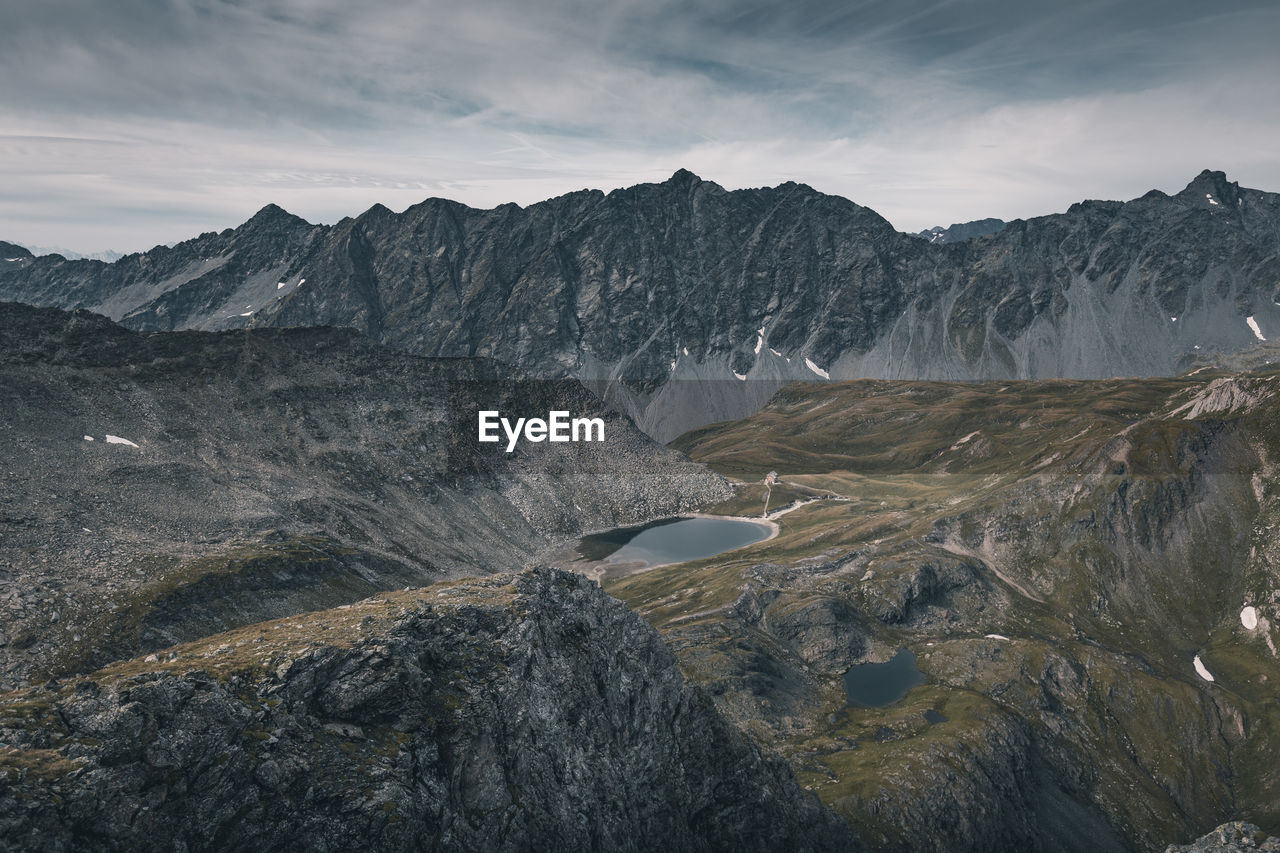 Scenic view of mountain range against sky