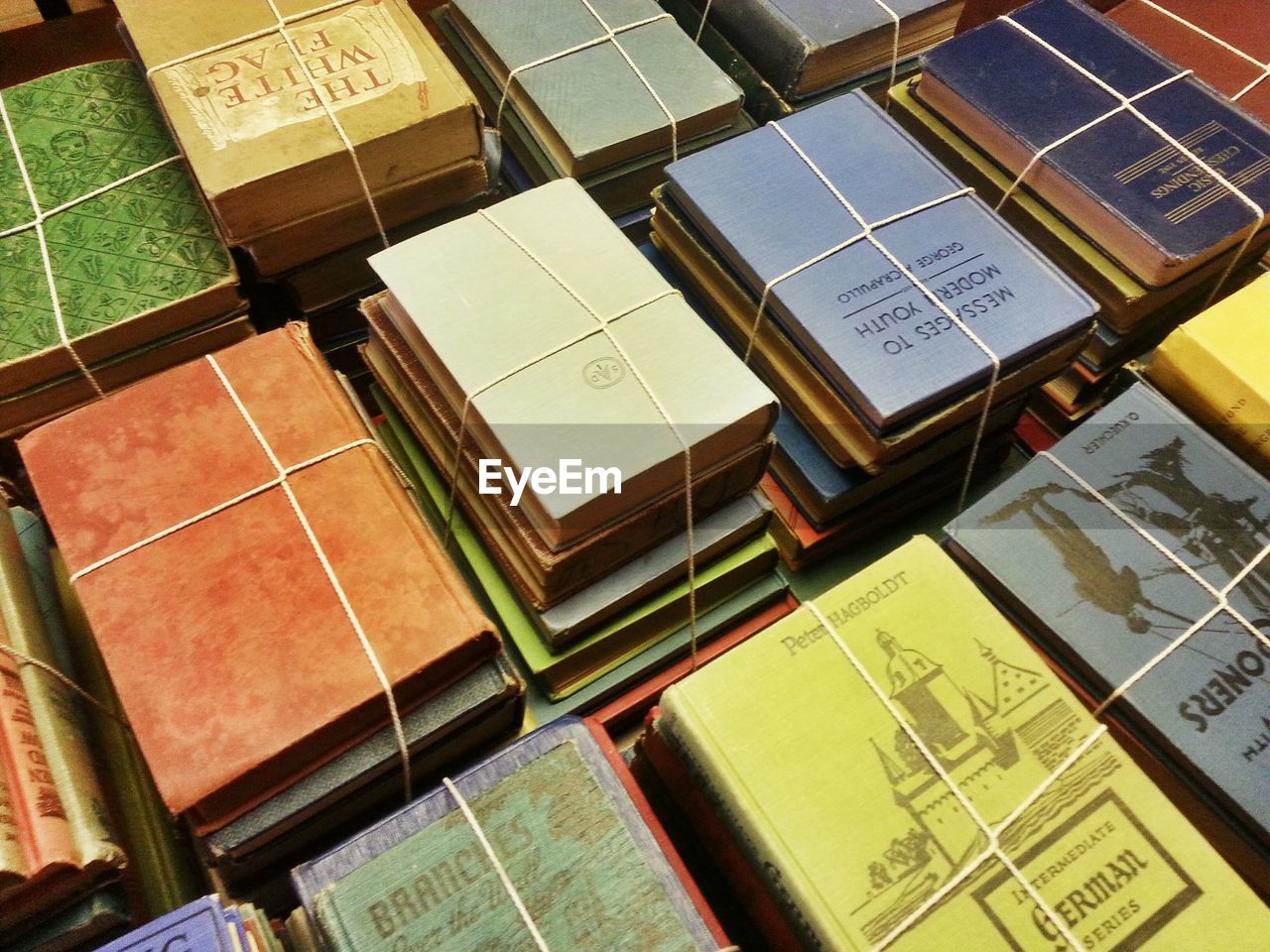 VIEW OF BOOKS ON TABLE