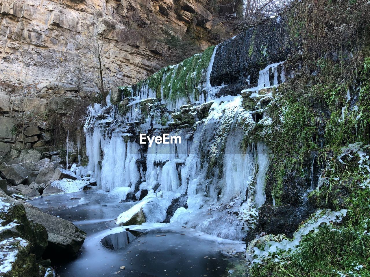 RIVER FLOWING THROUGH ROCKS