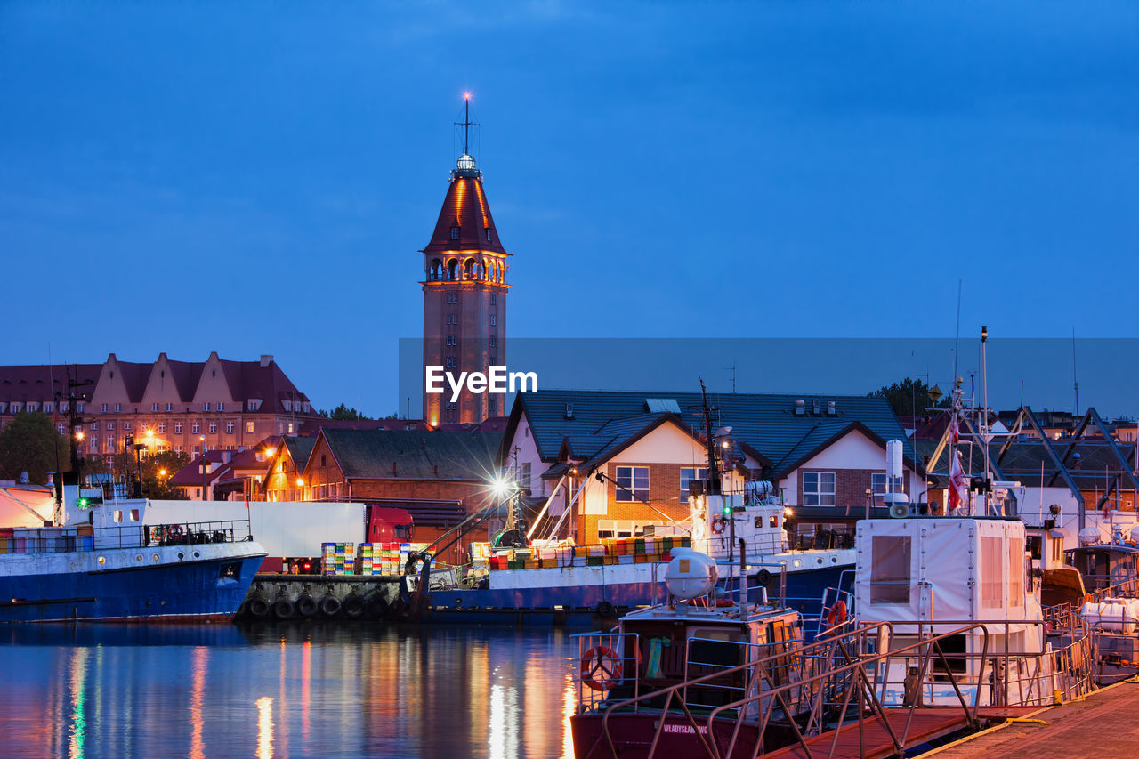 ILLUMINATED BUILDINGS AT NIGHT