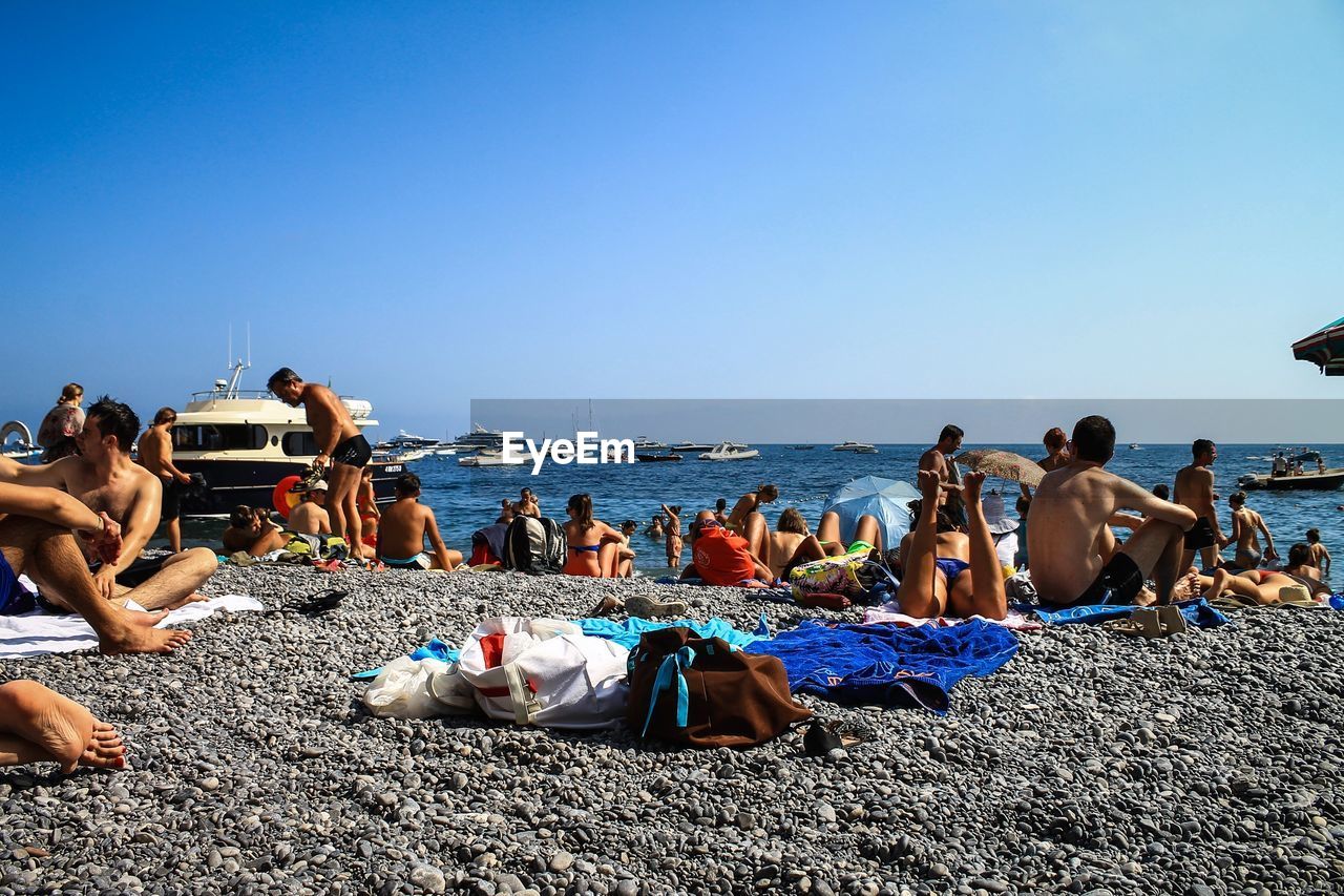 VIEW OF PEOPLE ON BEACH