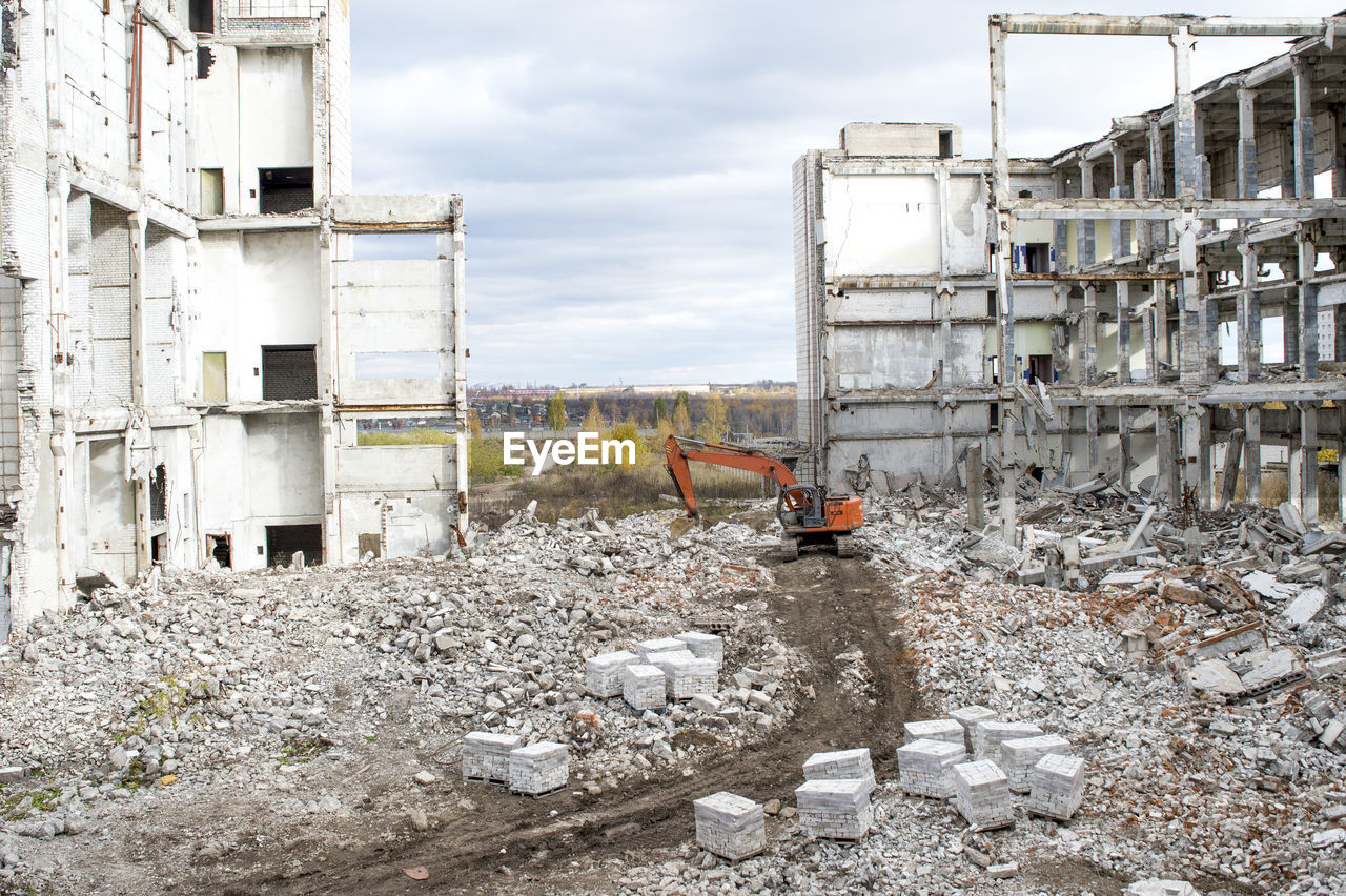 ABANDONED CONSTRUCTION SITE AGAINST SKY