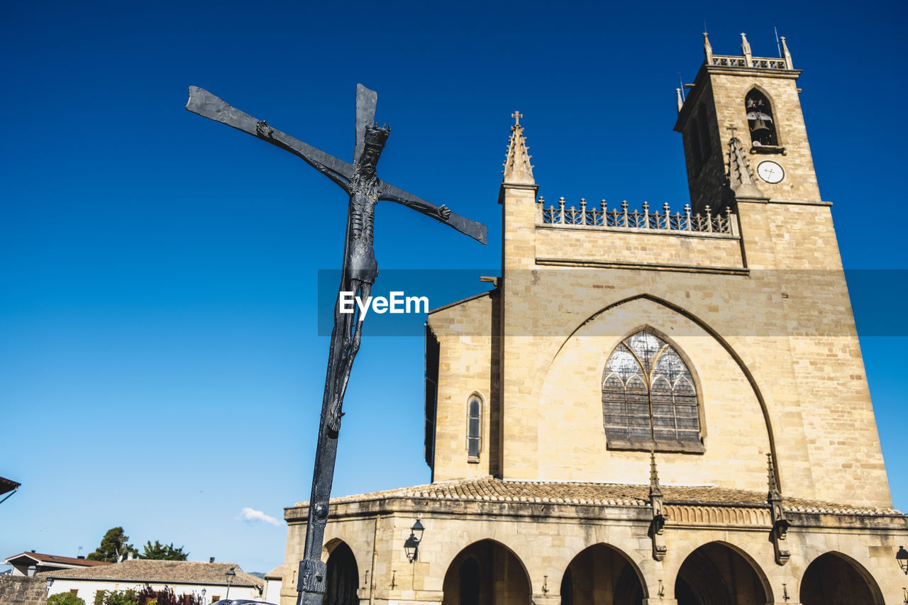 LOW ANGLE VIEW OF CHURCH AGAINST BUILDING