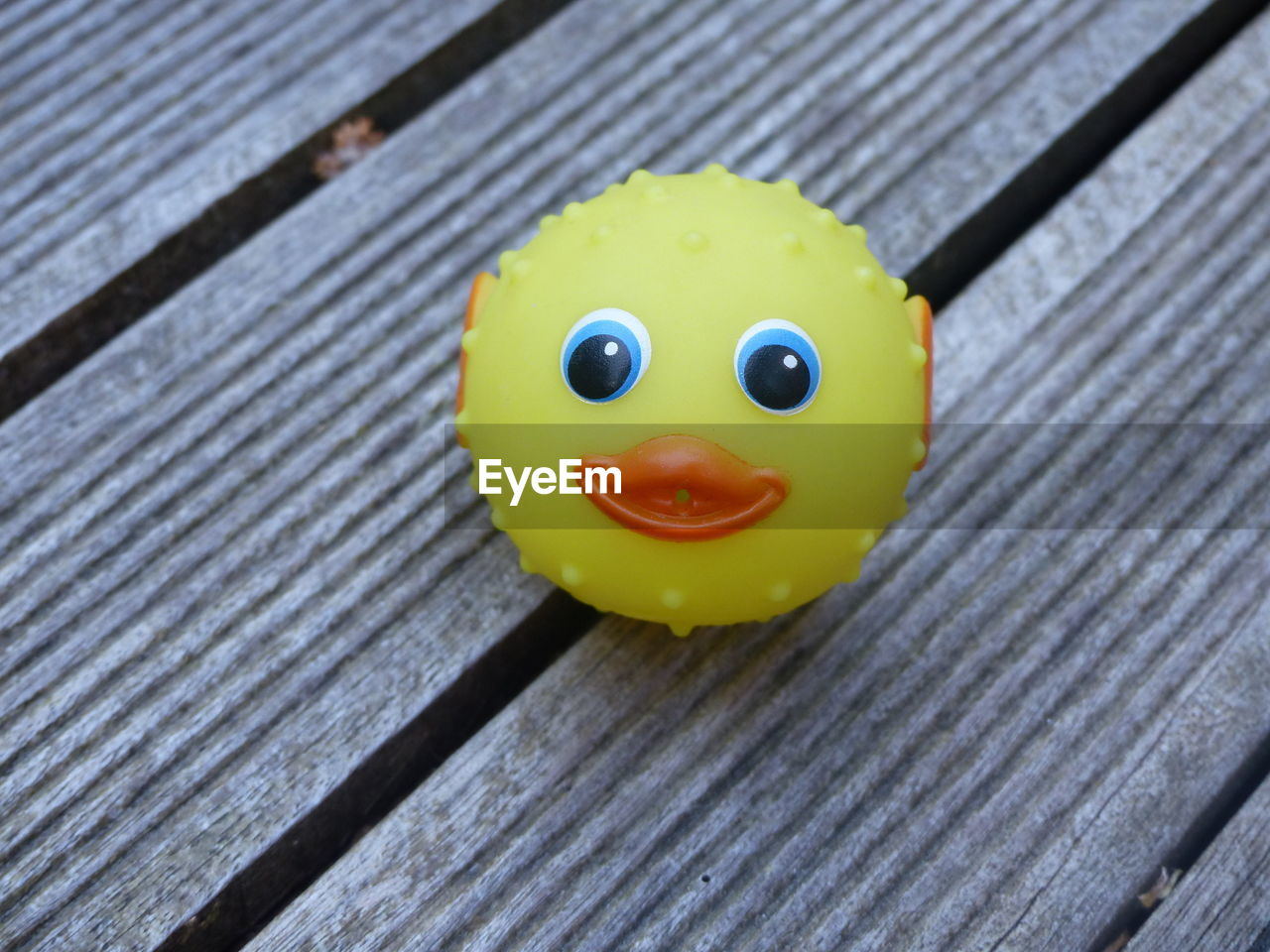 Close-up of rubber duck on table