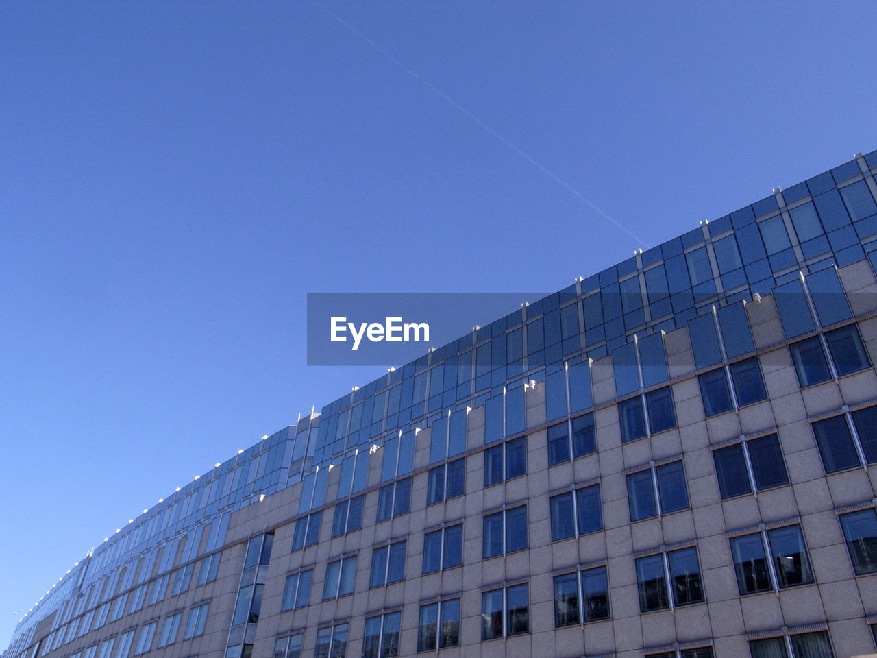 LOW ANGLE VIEW OF BUILDINGS AGAINST CLEAR SKY