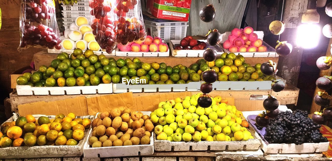 FRUITS FOR SALE IN MARKET STALL