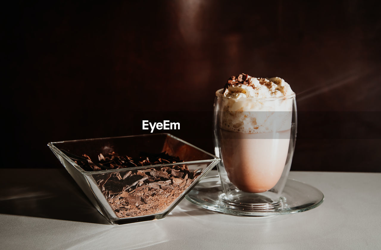 Cappuccino, coffee against a dark background