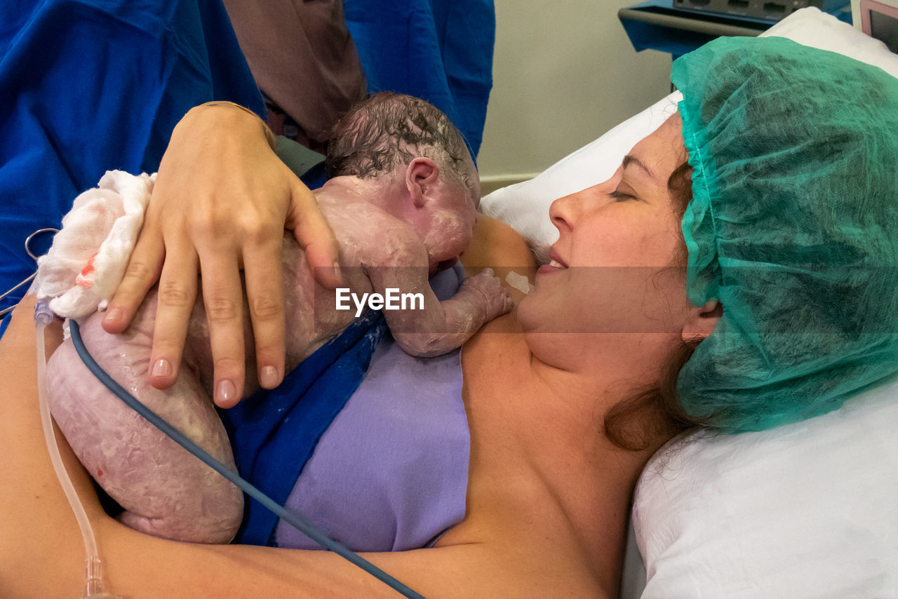 Mother daughter shortly after birth at hospital.