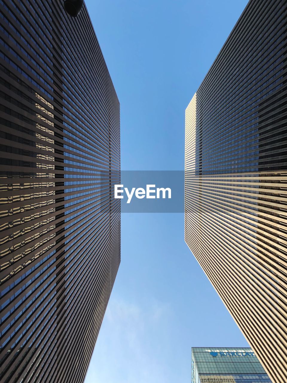 Low angle view of modern buildings against sky