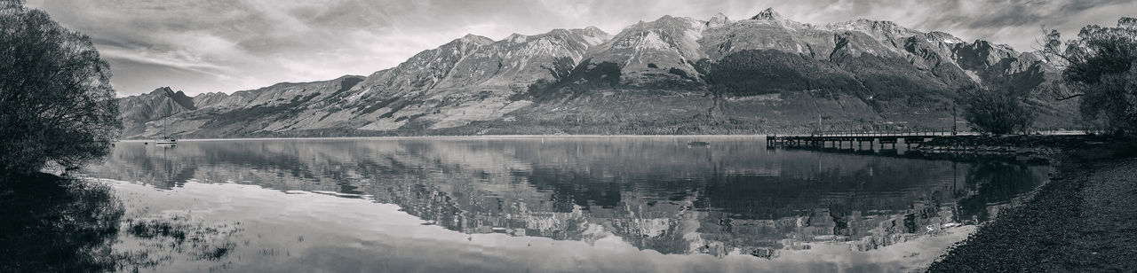 Scenic reflection of mountain range in lake