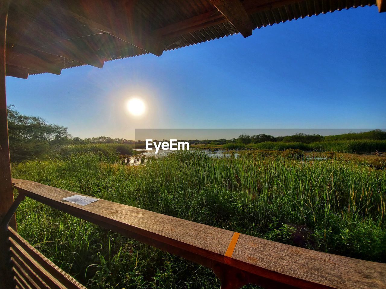 SCENIC VIEW OF LAND AGAINST SKY DURING SUNSET