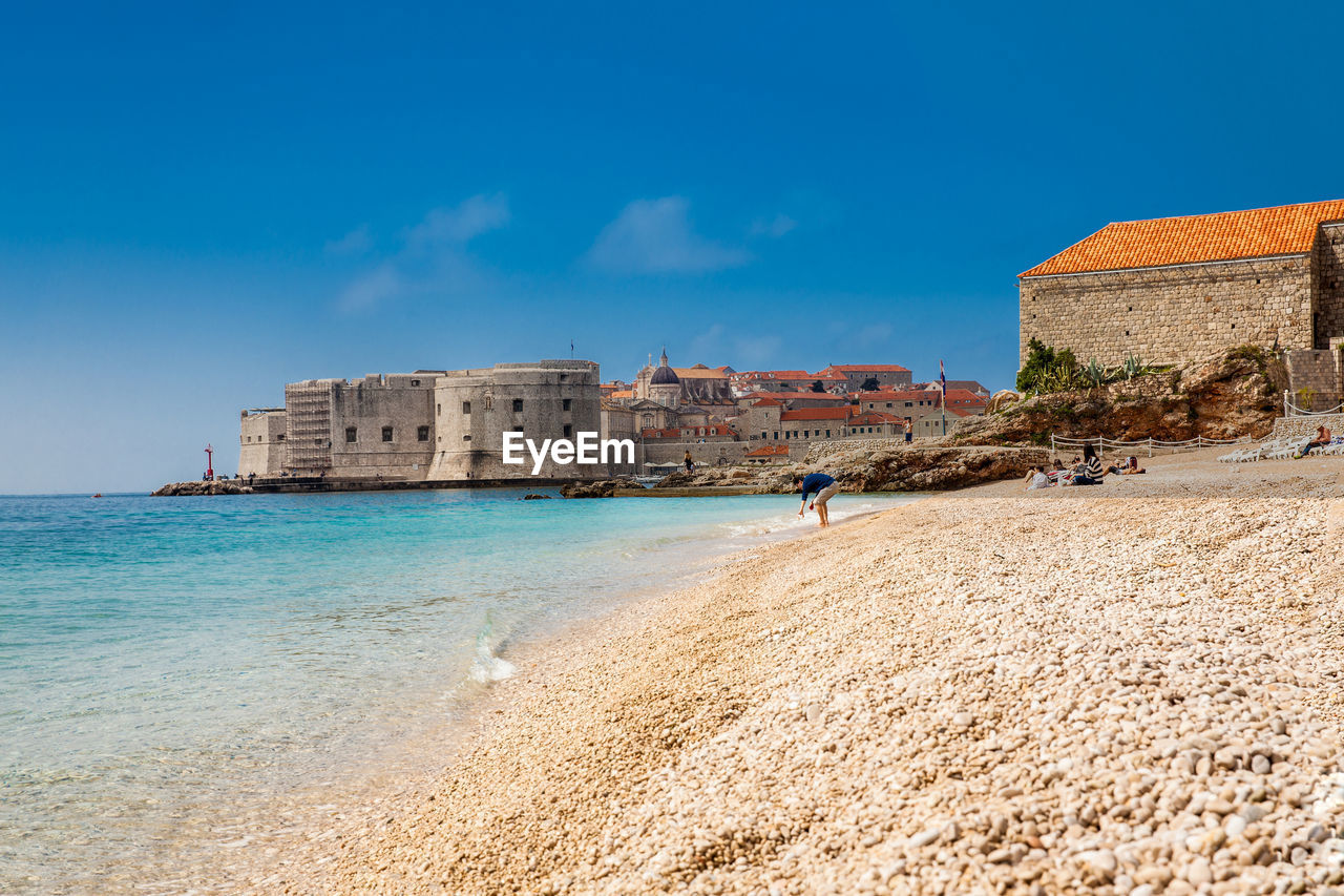 The beautiful banje beach and dubrovnik city