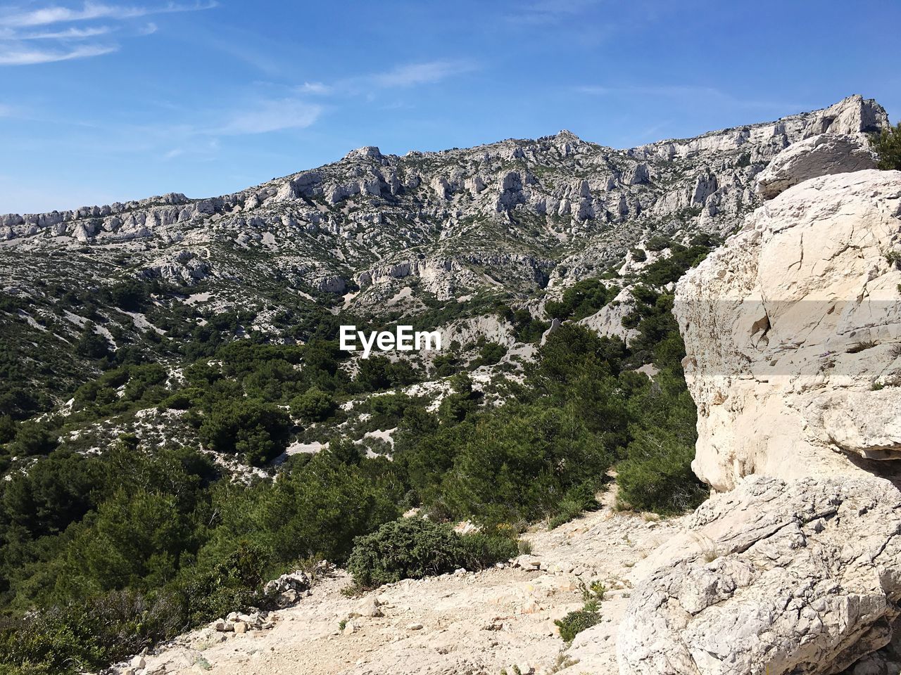 Scenic view of rocky mountains against sky