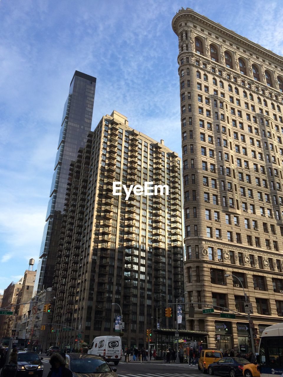 Low angle view of modern buildings against blue sky