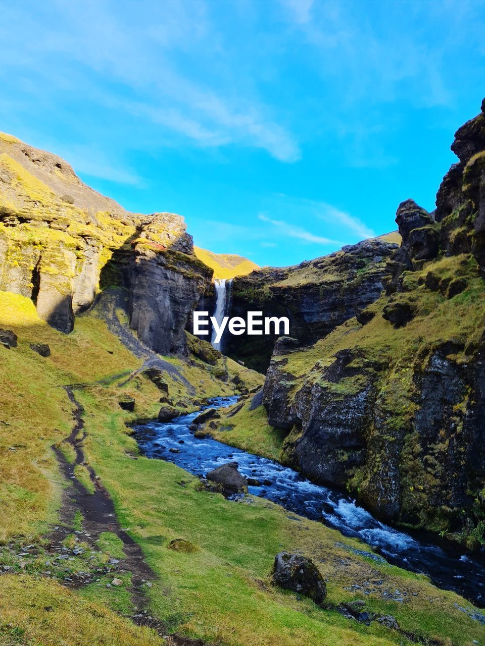 Rock formations on landscape against sky