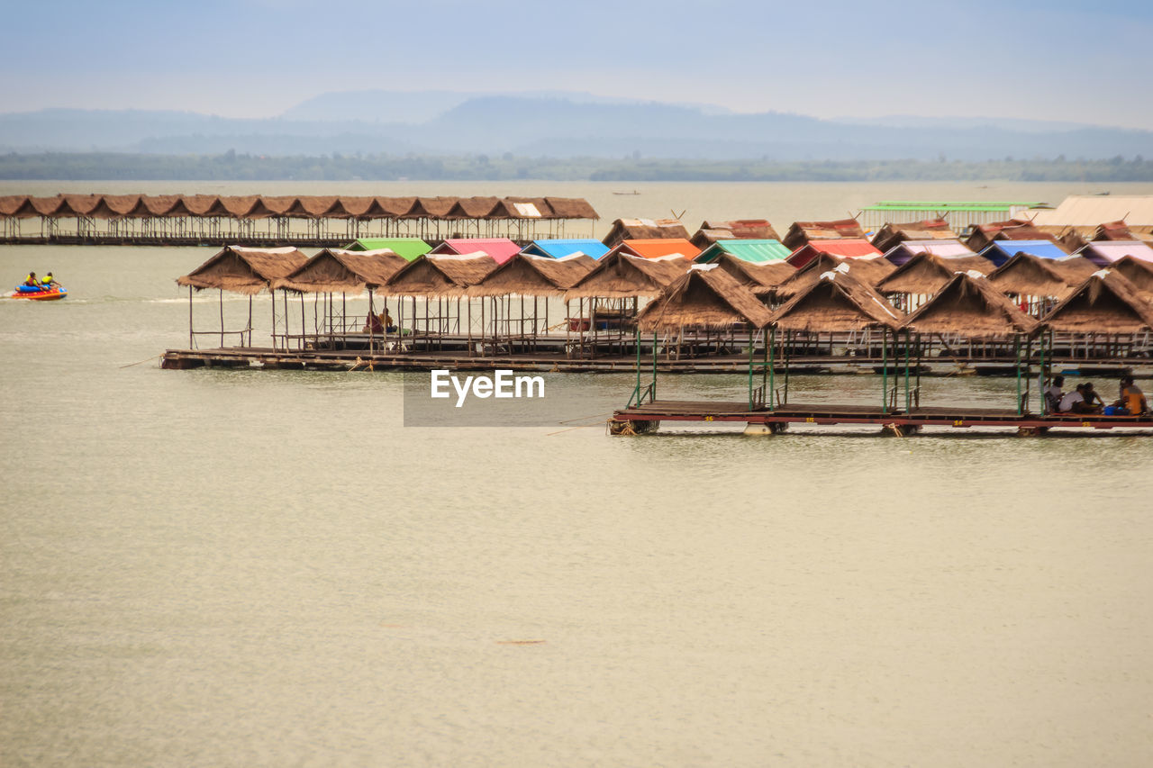 HOUSES AND SEA AGAINST BUILDINGS