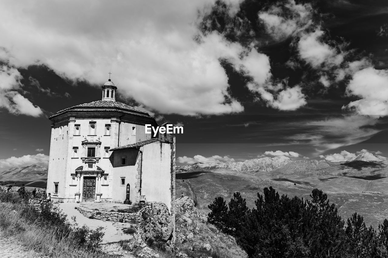 Scenic view of sea against sky, with church