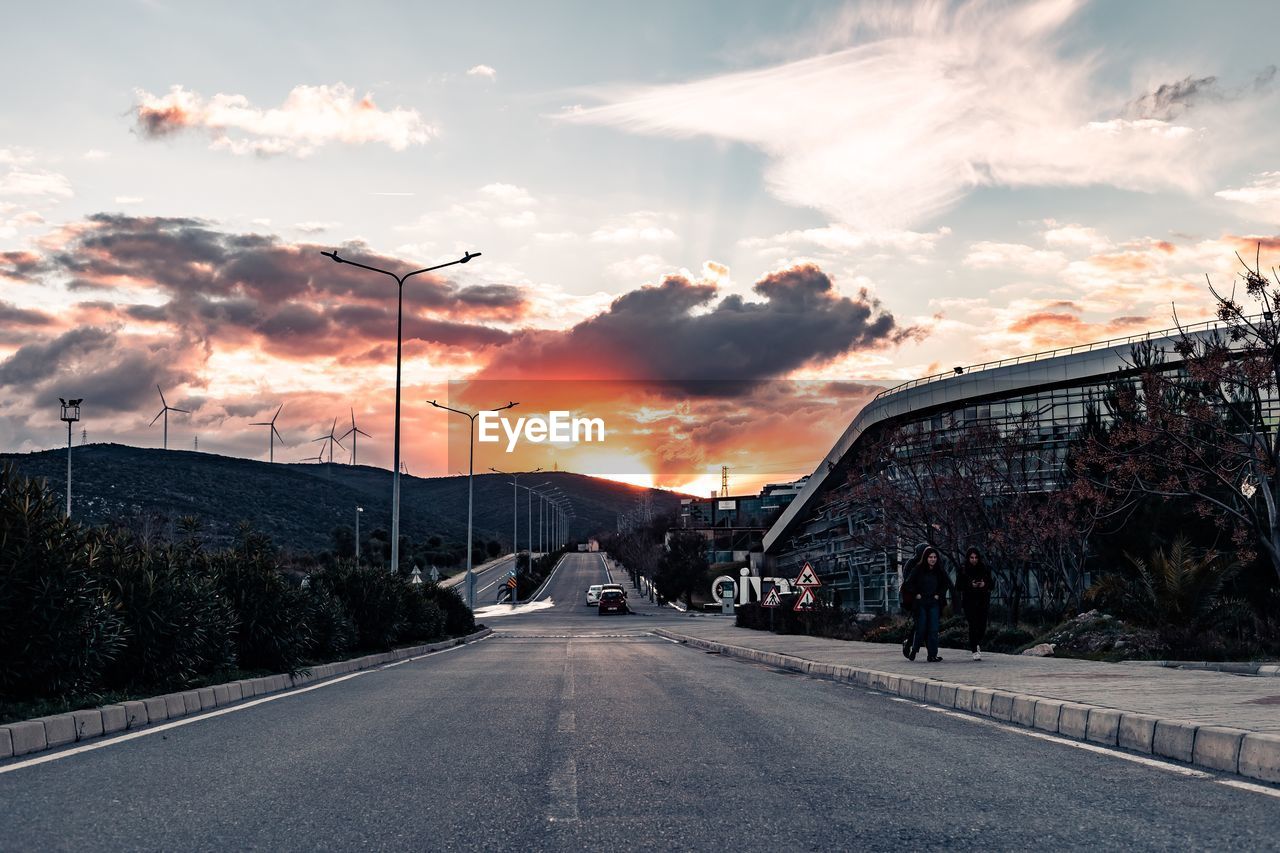 ROAD AGAINST SKY DURING SUNSET