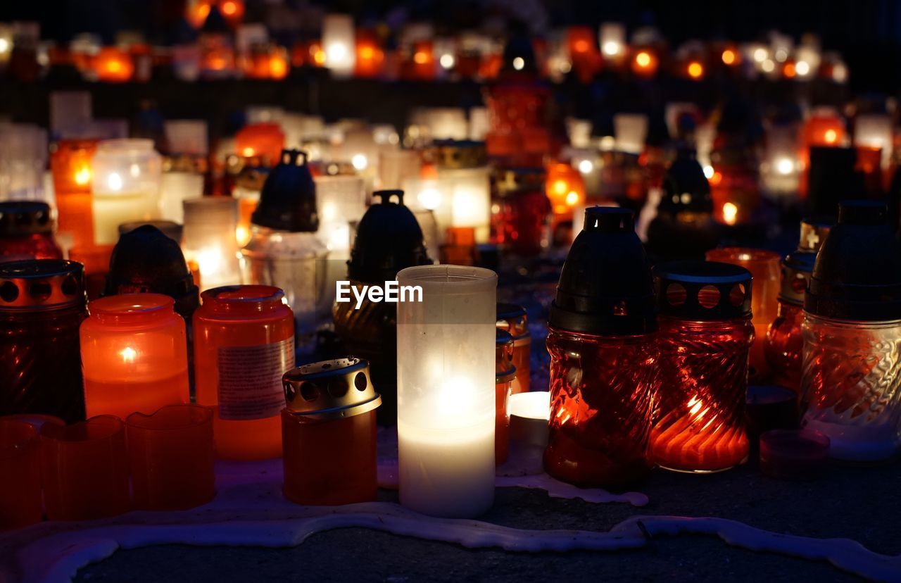 Candles on the cemetery during all saints day. night shot. slovakia