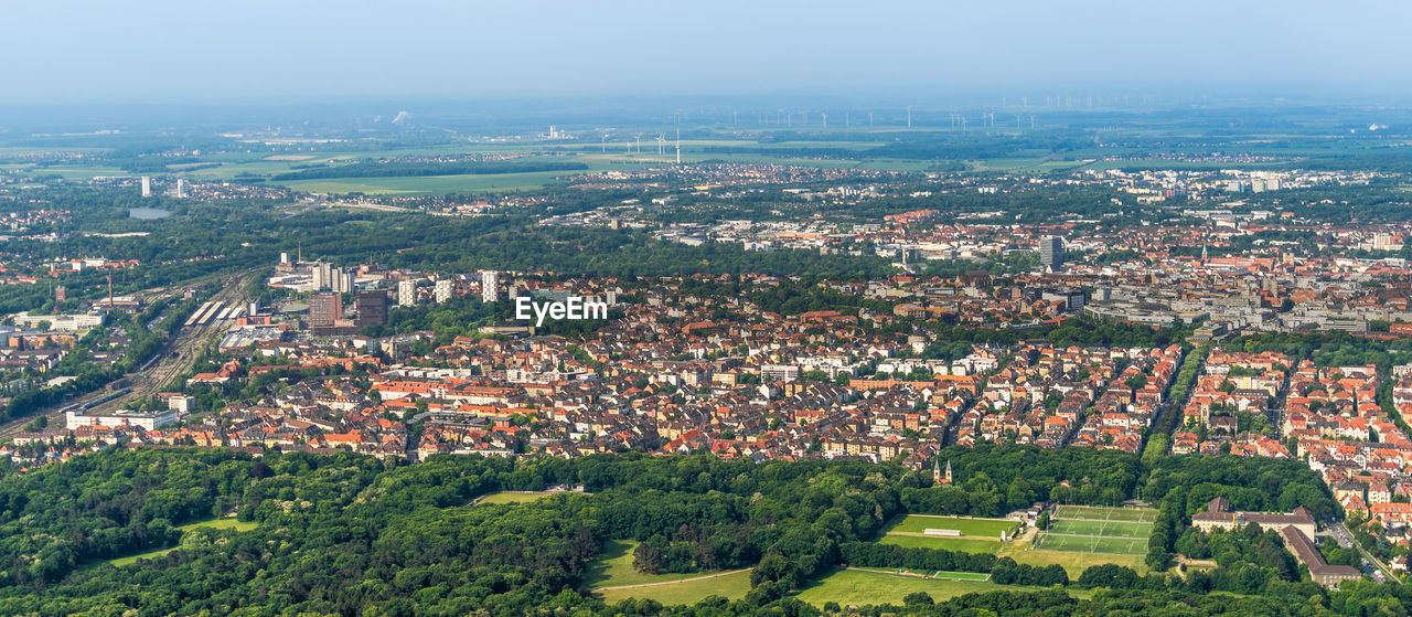 High angle view of townscape against sky in city