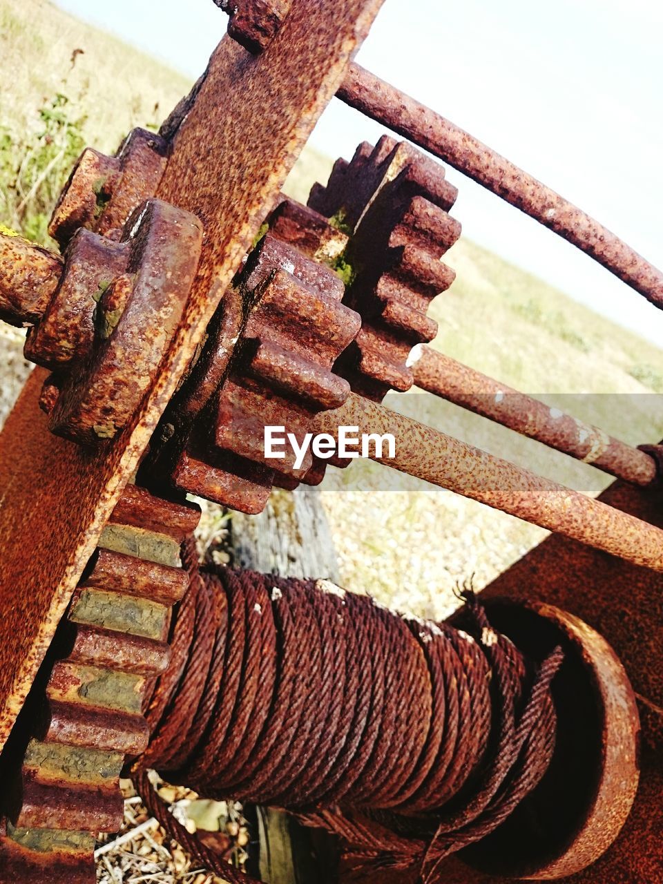 Rusty machinery on field