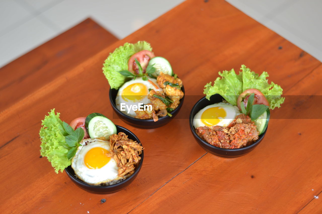 High angle view of breakfast served on table