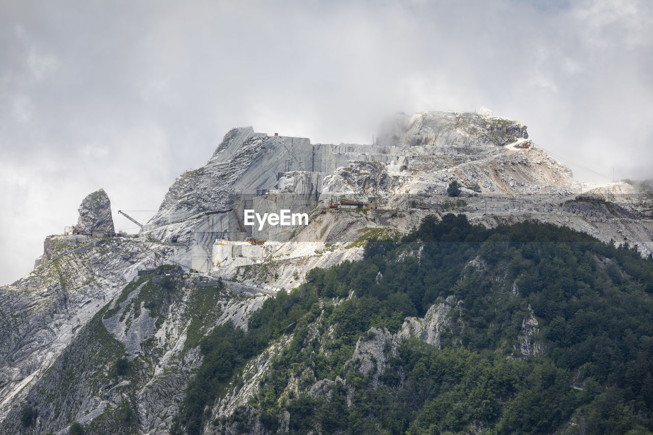 Low angle view of the marble quarry against the sky