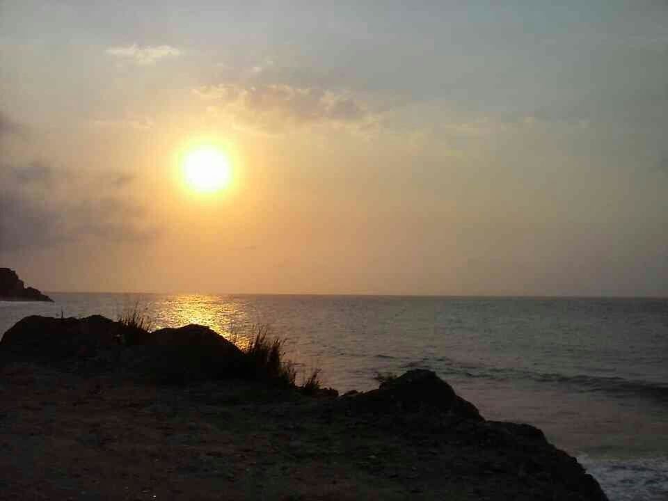 VIEW OF SEA AT SUNSET