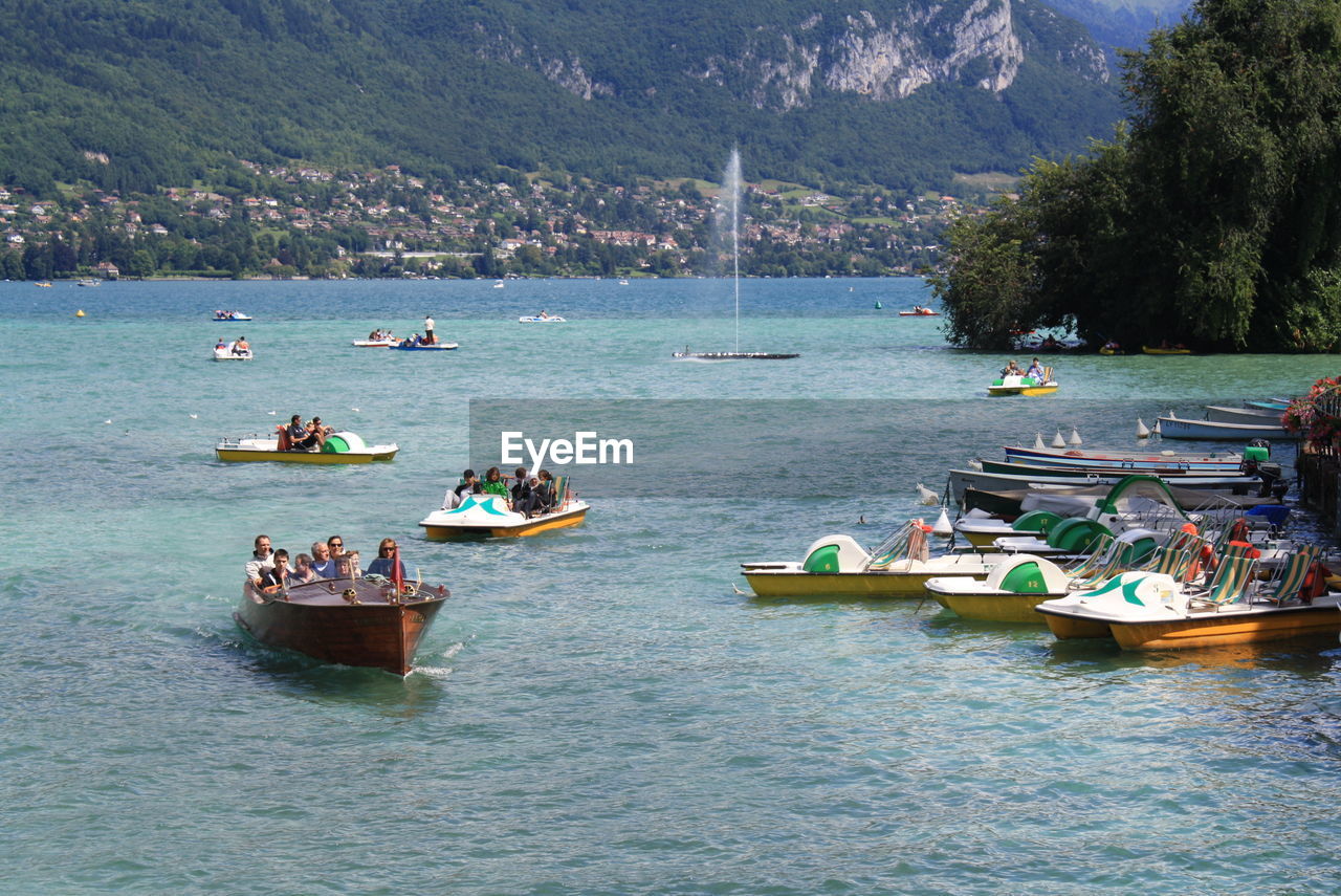 VIEW OF BOATS IN SEA