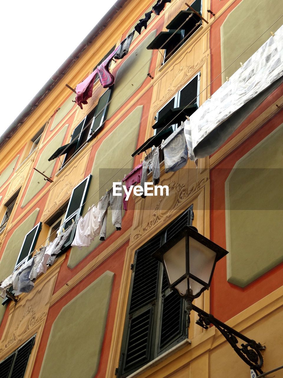 LOW ANGLE VIEW OF RESIDENTIAL BUILDING