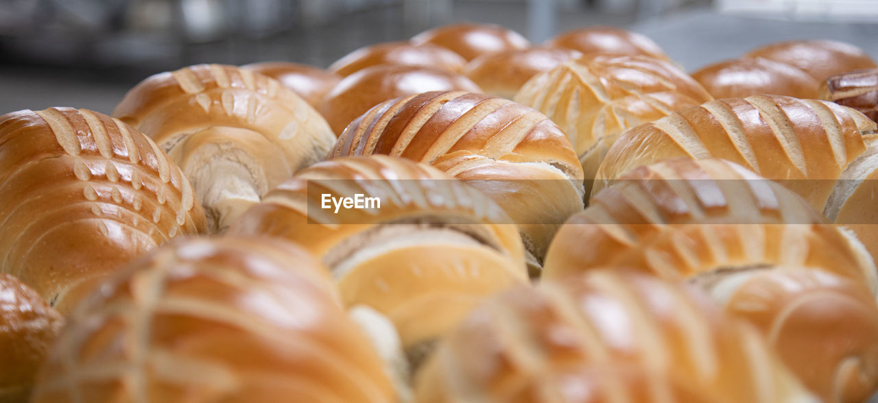 food, food and drink, freshness, baked, dessert, selective focus, large group of objects, close-up, french food, sweet food, no people, store, bakery, bread, indoors, abundance, sweet, cuisine, still life, snack, bun, tradition, pastry, baked pastry item, in a row, business