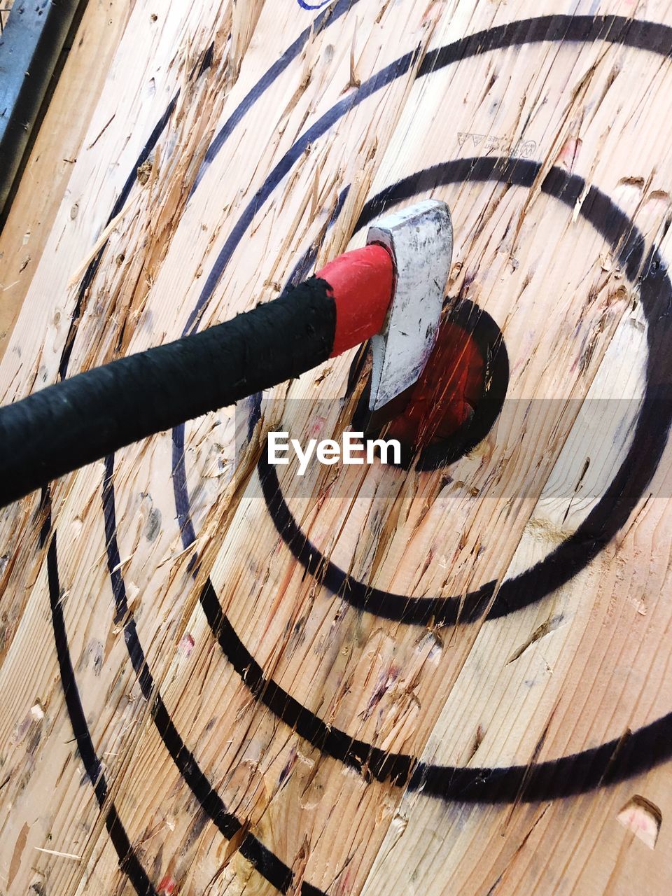 CLOSE-UP OF ROPE ON WOODEN WALL