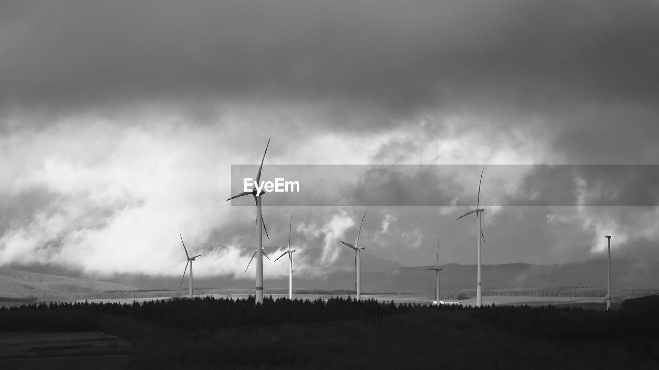 WIND TURBINES ON FIELD