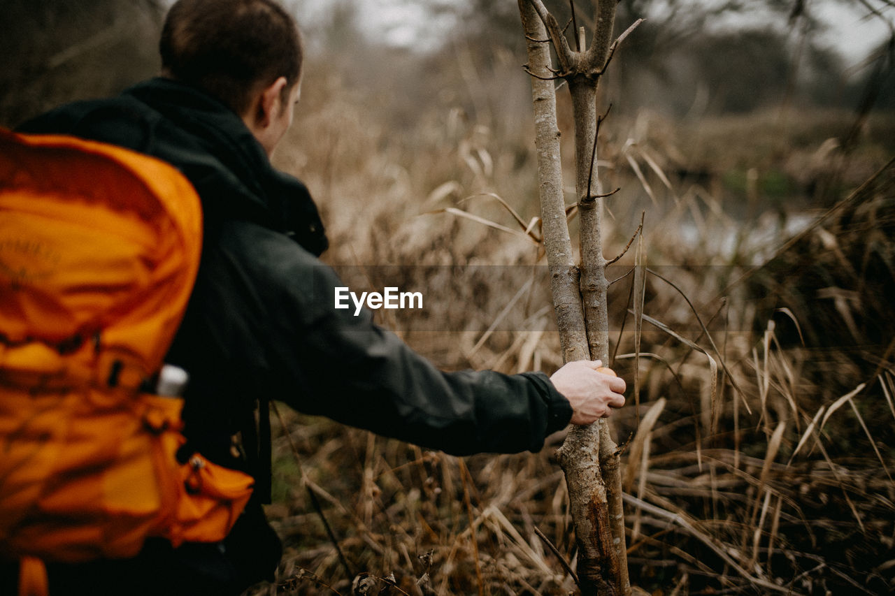 Man exploring the itchen river, hampshire uk in winter