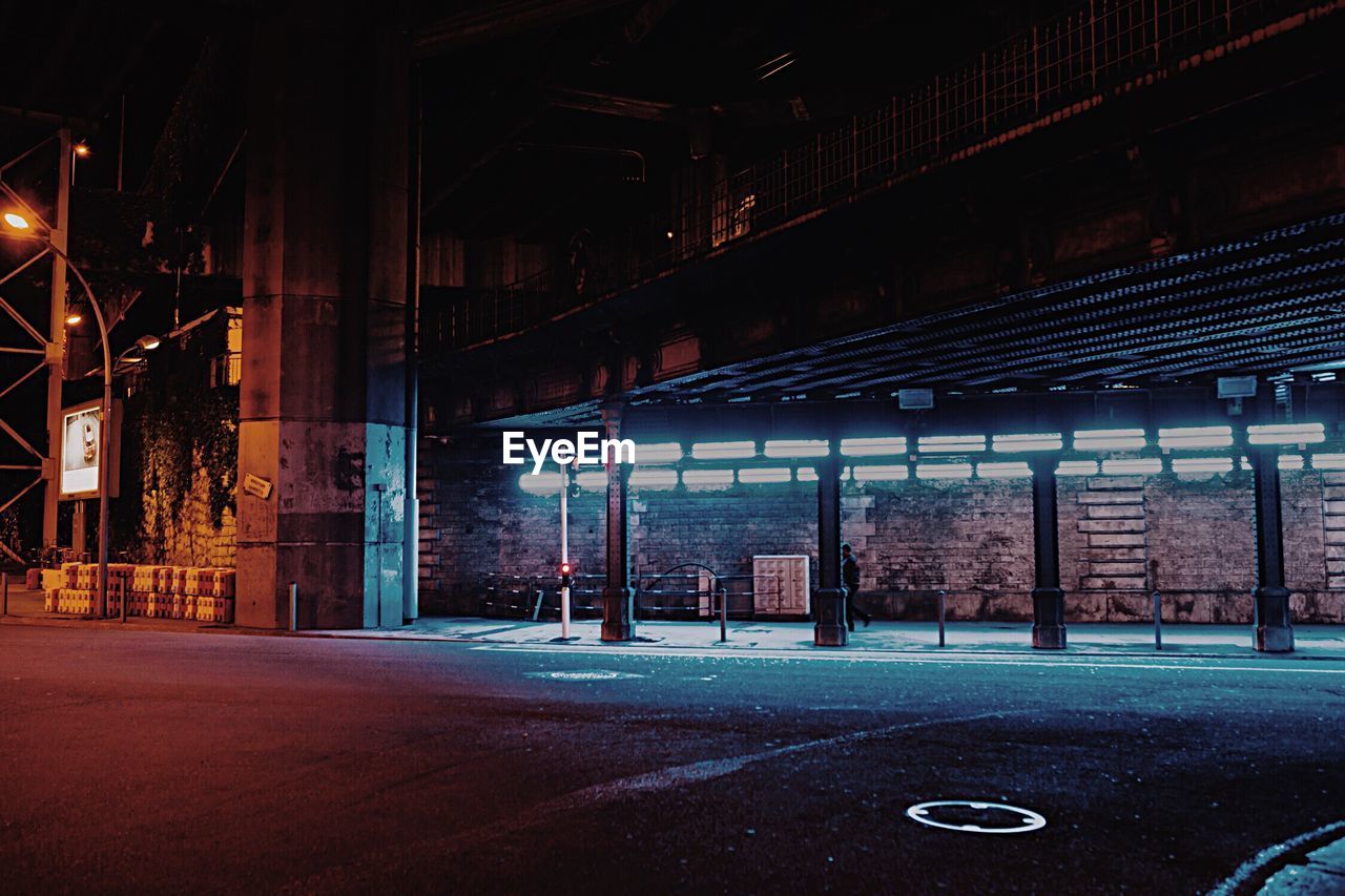 Illuminated building in city at night