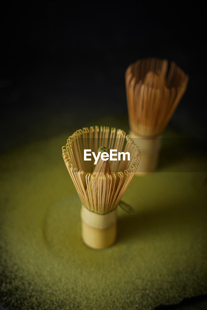 lighting, yellow, macro photography, indoors, no people, still life, food and drink, close-up, food, cupcake, flower, studio shot