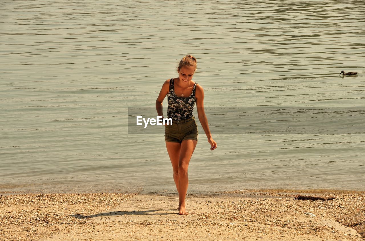 Full length of woman on beach