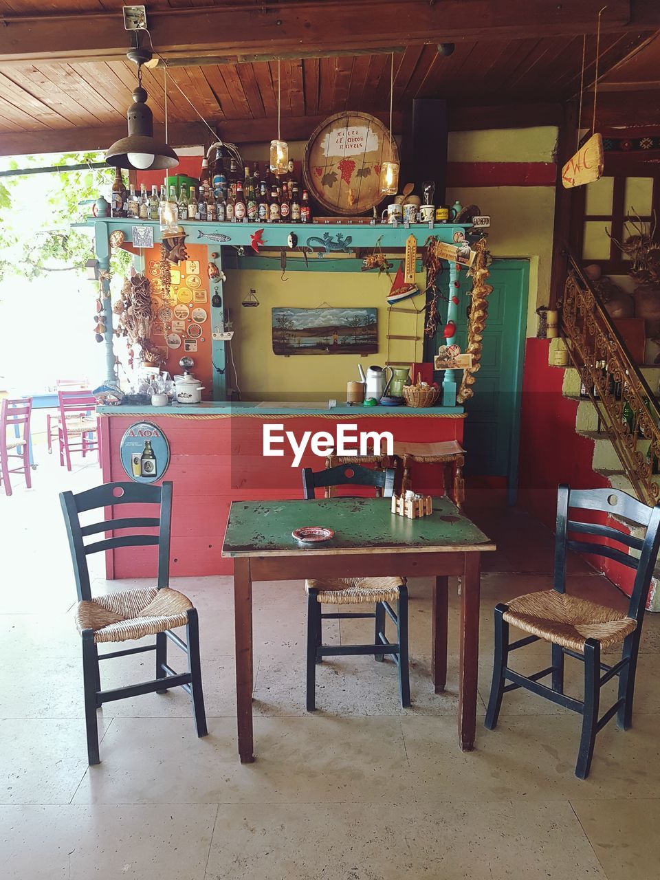 CHAIRS AND TABLES IN ROOM