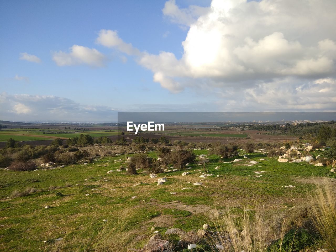 SCENIC VIEW OF LAND AGAINST SKY DURING SUNSET