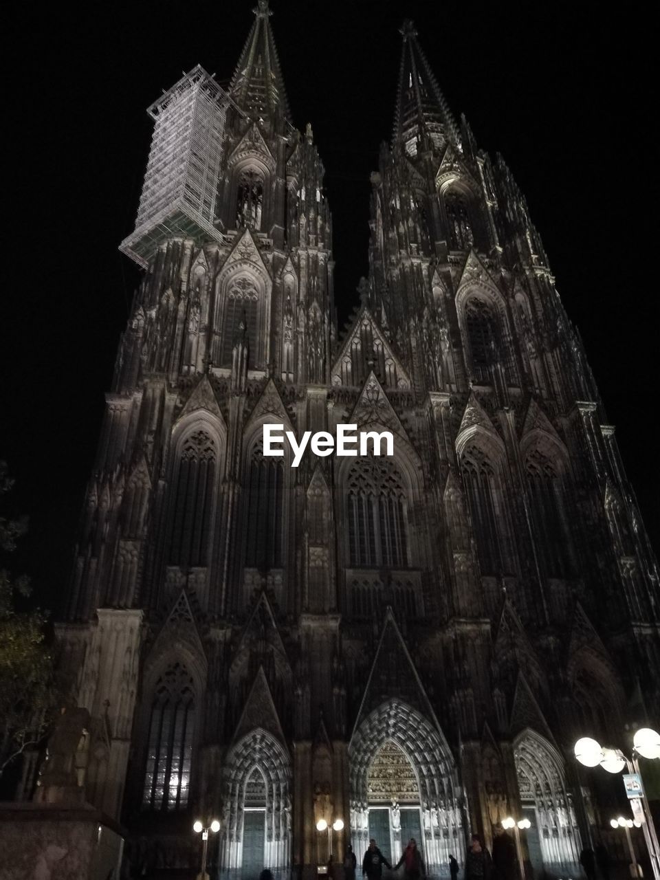 LOW ANGLE VIEW OF ILLUMINATED CATHEDRAL