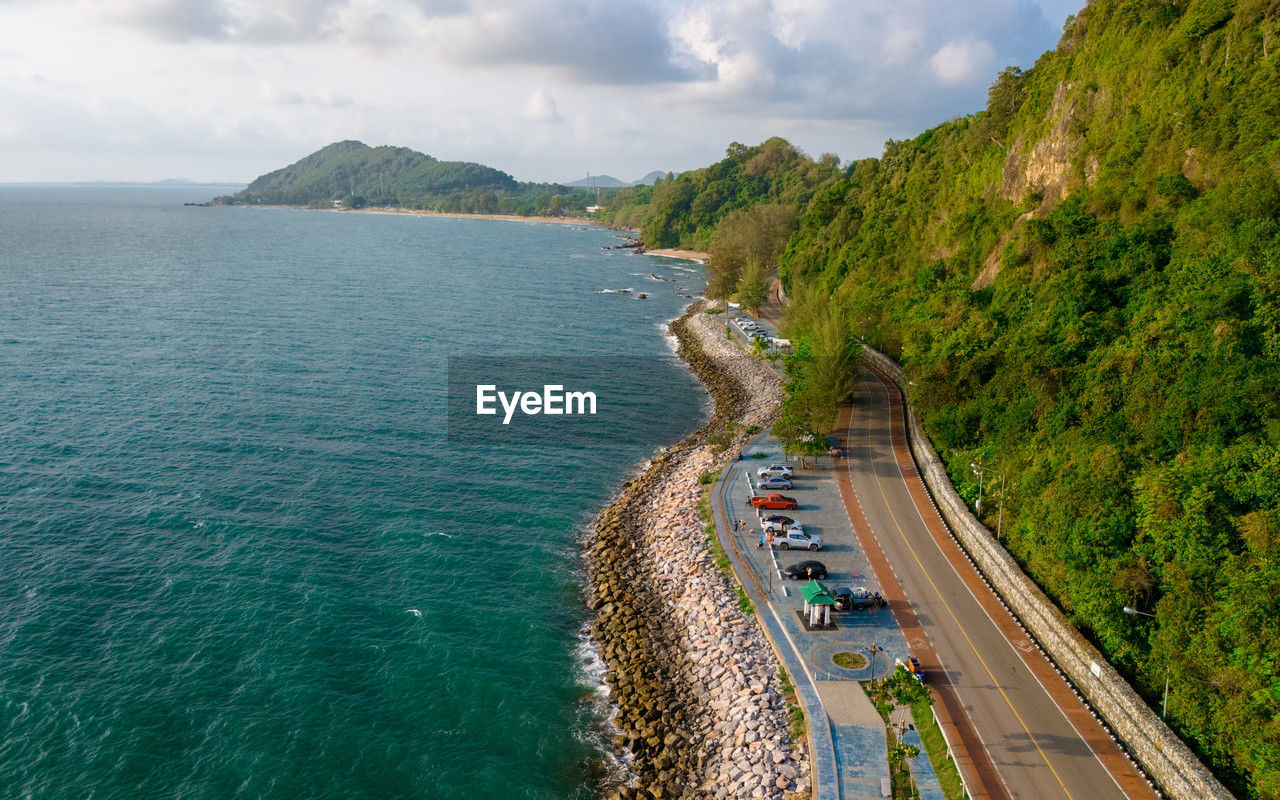 high angle view of road by mountain against sky