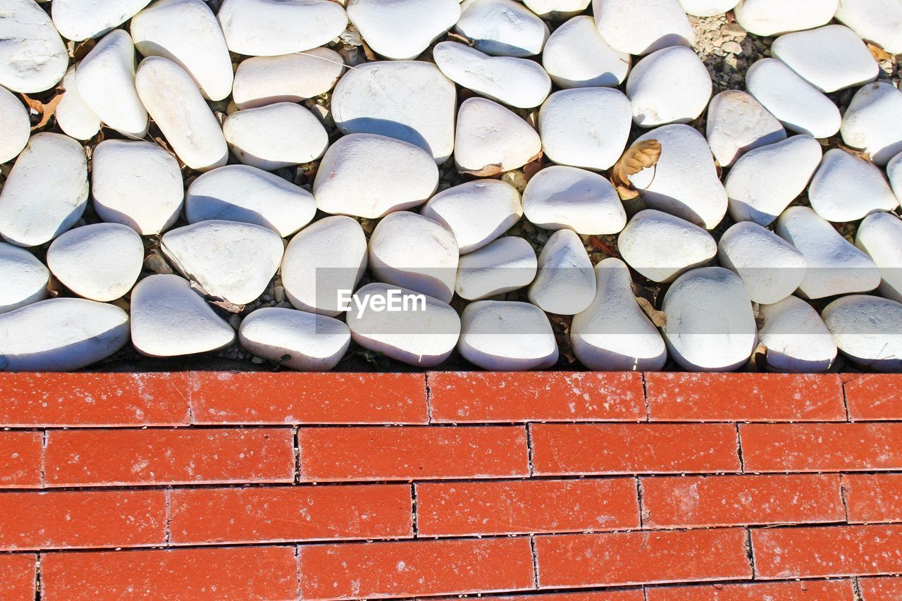 High angle view of pathway over white stones