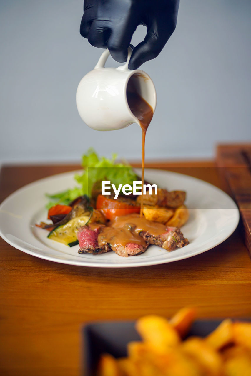 Close-up of food in plate on table