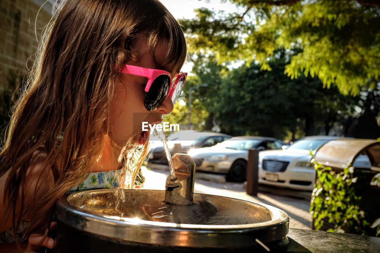 PORTRAIT OF GIRL WITH SUNGLASSES