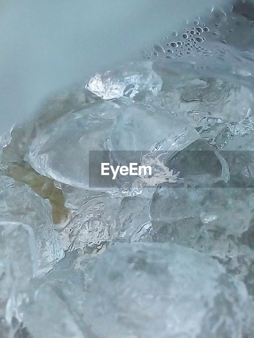 CLOSE-UP OF ICE IN WATER